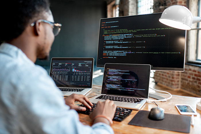 Programmer working with program code Software Engineering