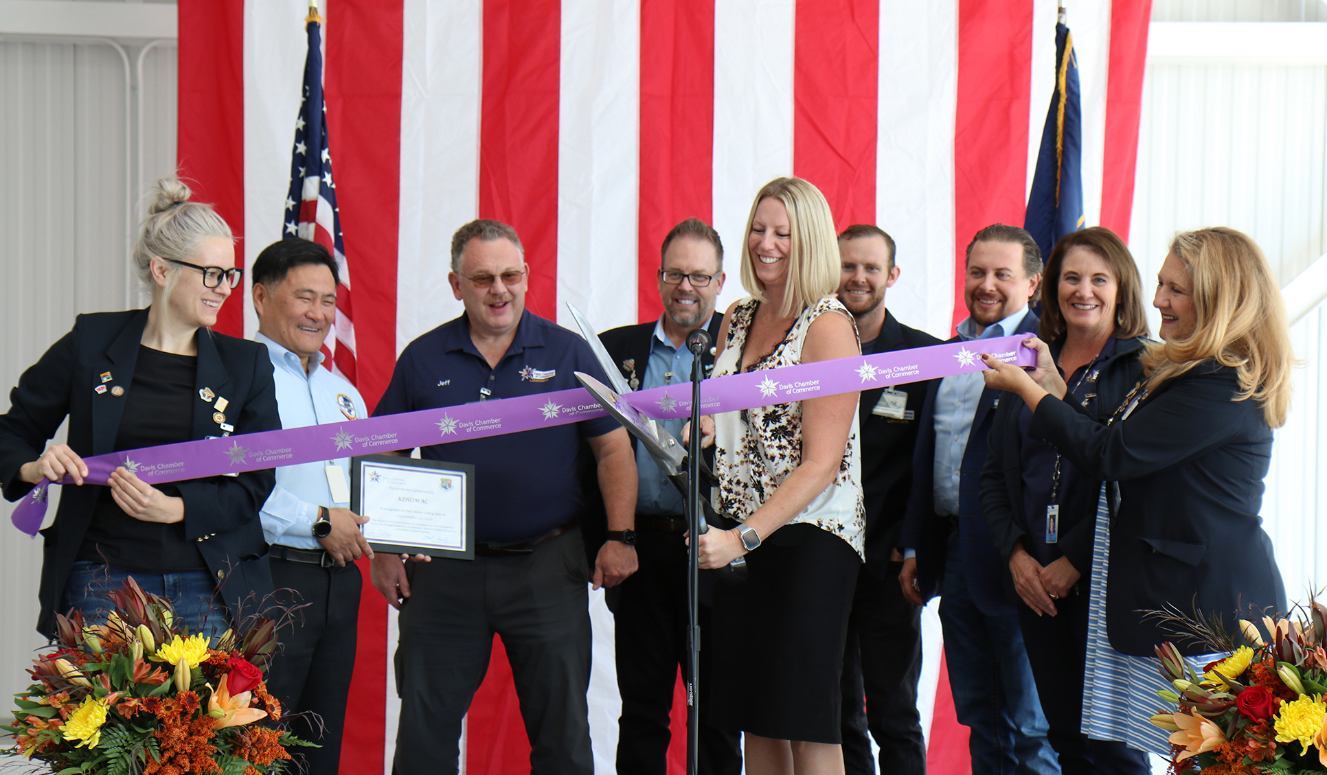 KIHOMAC team celebrating the delivery of the 400th A-10 Universal Rudder with new aircraft hangar in the background.
